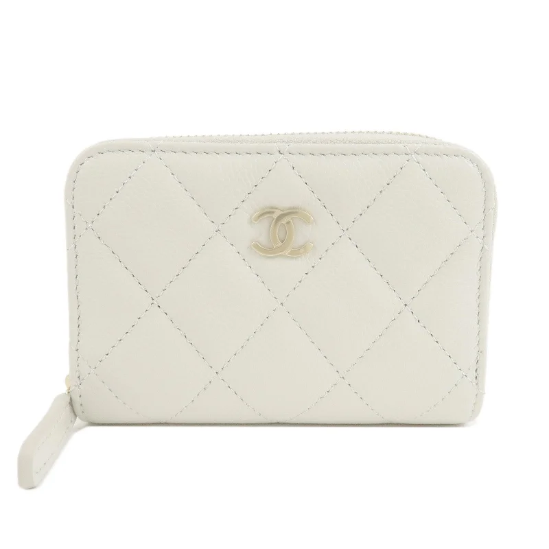 CHANEL Matelasse Caviar Skin Round Zipper Coin Case Ivory AP0216